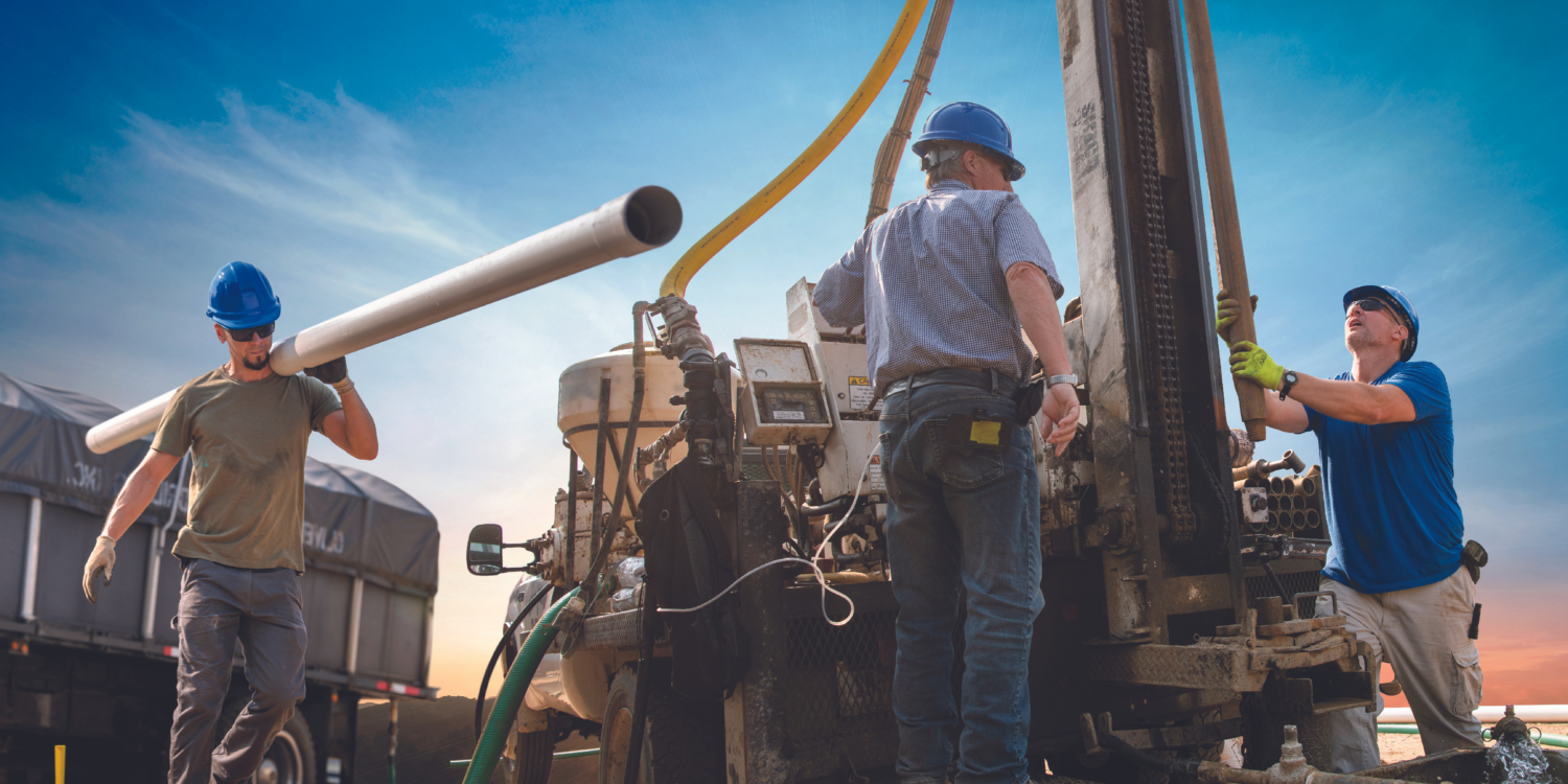 pipe workers in action